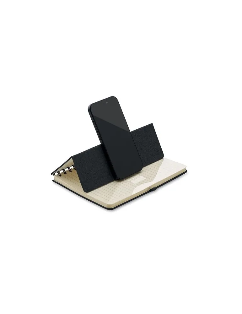 Cahier A5 publicitaire avec support de téléphone STRATA Matières : plastique Couleurs : blanc cadeau collaborateur premium