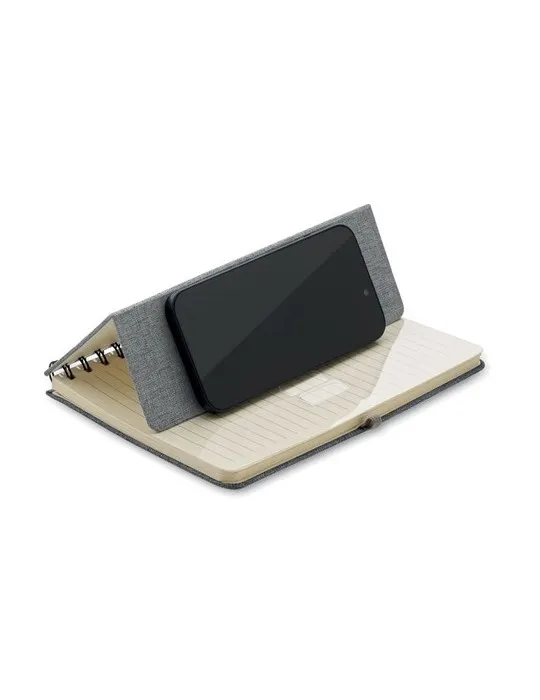 Cahier A5 publicitaire avec support de téléphone STRATA Matières : plastique Couleurs : blanc goodies entreprise design