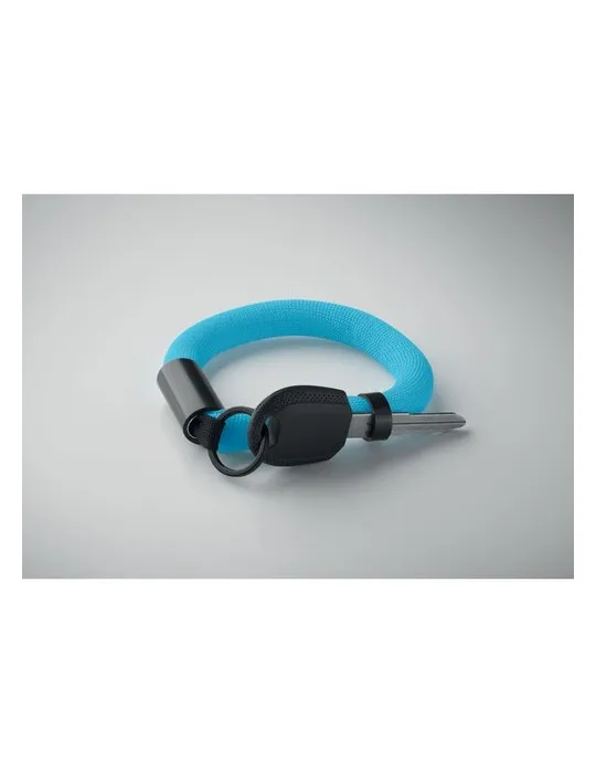 Bracelet porte-clés flottant personnalisé POLLY Couleurs : noir Matières : acier inoxydable recyclé accessoire événementiel uniq